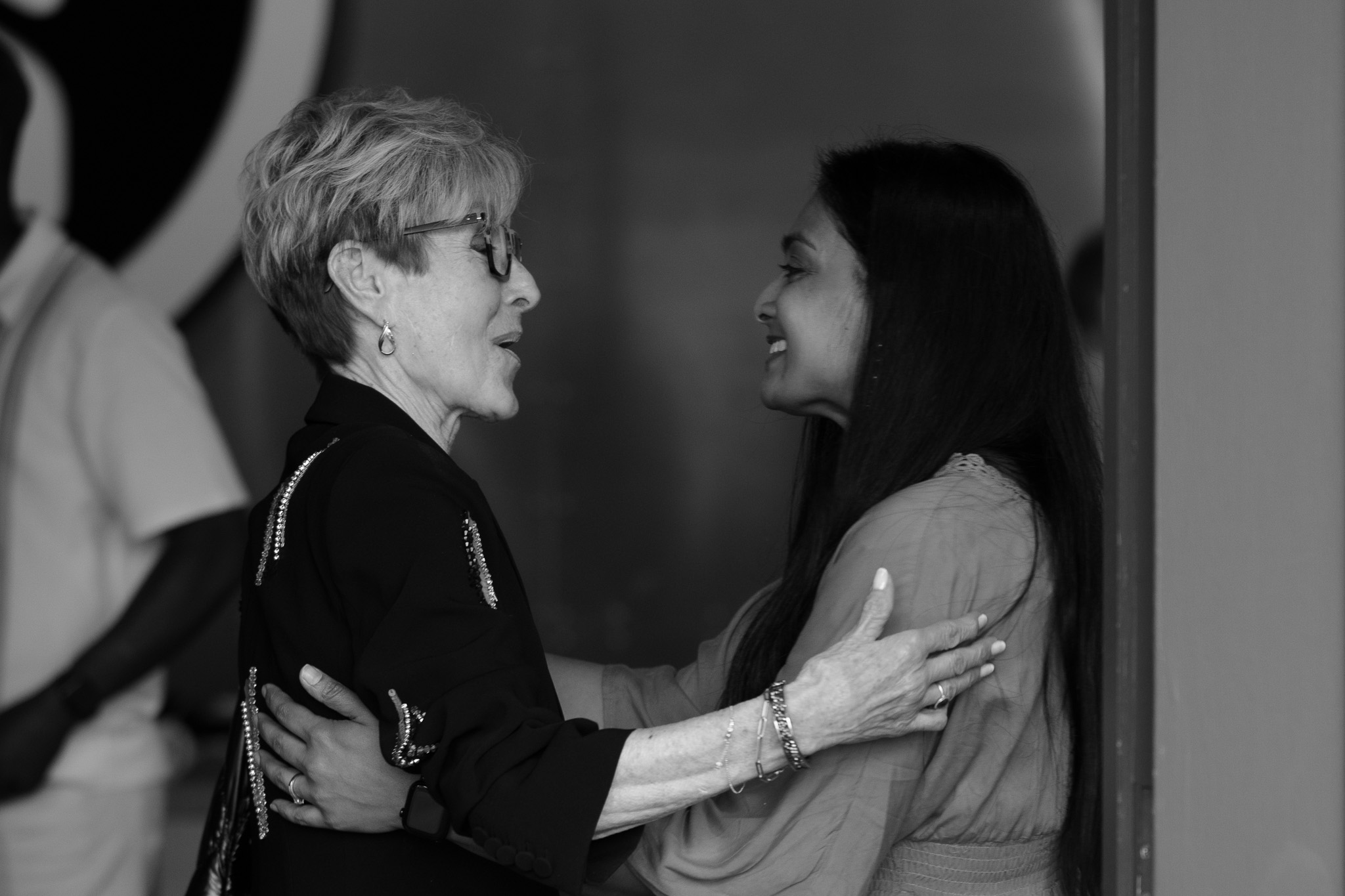 Two women supporting one another at church